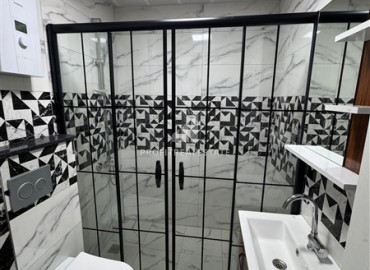 Стильные апартаменты 1+1 с дизайнерским интерьером, 55м², в комплексе премиум класса в Махмутларе, Алания ID-18835 фото-13