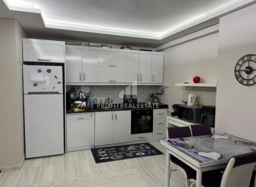 Большая меблированная квартира с одной спальней, 70м² в комплексе с зимним бассейном в 250м от моря в Махмутларе, Алания ID-18836 фото-2