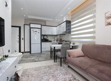 Современная двухкомнатная квартира, 50м² в комплексе с зимним бассейном в 900м от пляжа Инджекум в Авсалларе ID-18838 фото-2