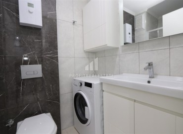 Современная двухкомнатная квартира, 50м² в комплексе с зимним бассейном в 900м от пляжа Инджекум в Авсалларе ID-18838 фото-9