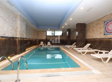 Современная двухкомнатная квартира, 50м² в комплексе с зимним бассейном в 900м от пляжа Инджекум в Авсалларе ID-18838 фото-12