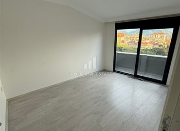 Квартира с двумя спальнями, 120м², оригинальной планировки в новом доме городского типа в центре Алании ID-18840 фото-10