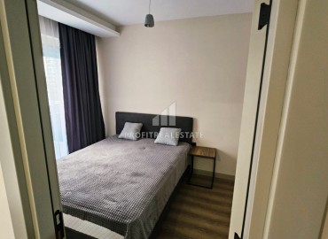 Меблированная двухкомнатная квартира, 60м² в комплексе премиум класса в 450м от моря в районе Мерсина - Тедже. ID-18842 фото-11