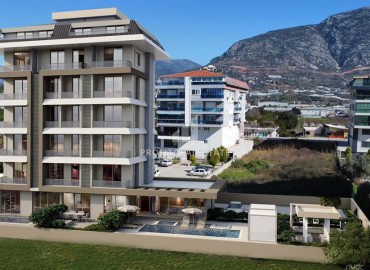 Новый инвестиционный проект с хорошей инфраструктурой, квартиры 55-232м², в 300м от моря в районе Кестель, Алания ID-18844 фото-1