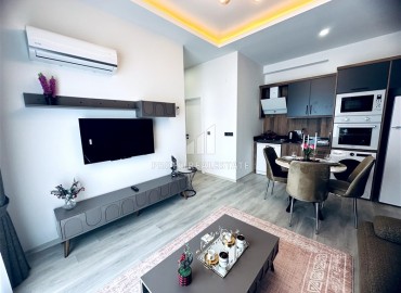 Элегантная двухкомнатная квартира, 55м², в новостройке с хорошей инфраструктурой в Махмутларе, Алания ID-18848 фото-3