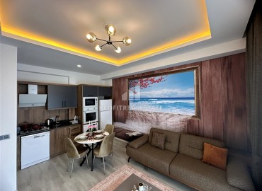 Элегантная двухкомнатная квартира, 55м², в новостройке с хорошей инфраструктурой в Махмутларе, Алания ID-18848 фото-4