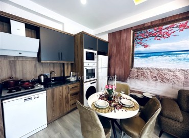 Элегантная двухкомнатная квартира, 55м², в новостройке с хорошей инфраструктурой в Махмутларе, Алания ID-18848 фото-6