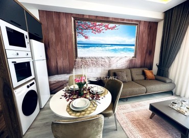 Элегантная двухкомнатная квартира, 55м², в новостройке с хорошей инфраструктурой в Махмутларе, Алания ID-18848 фото-9