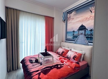 Элегантная двухкомнатная квартира, 55м², в новостройке с хорошей инфраструктурой в Махмутларе, Алания ID-18848 фото-12