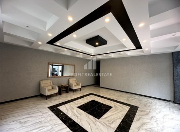 Элегантная двухкомнатная квартира, 55м², в новостройке с хорошей инфраструктурой в Махмутларе, Алания ID-18848 фото-15