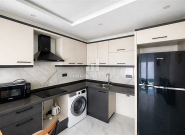 Меблированные апартаменты с одной спальней, 50м², в новостройке премиум класса в Авсалларе, Алания ID-18850 фото-3