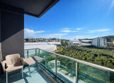 Меблированные апартаменты с одной спальней, 50м², в новостройке премиум класса в Авсалларе, Алания ID-18850 фото-6