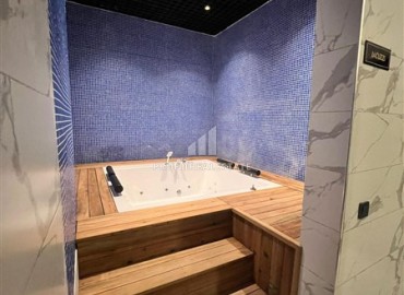 Меблированные апартаменты с одной спальней, 50м², в новостройке премиум класса в Авсалларе, Алания ID-18850 фото-8