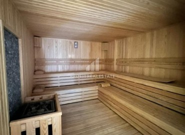 Меблированные апартаменты с одной спальней, 50м², в новостройке премиум класса в Авсалларе, Алания ID-18850 фото-9