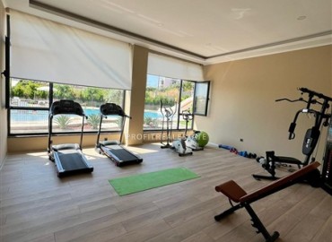 Меблированные апартаменты с одной спальней, 50м², в новостройке премиум класса в Авсалларе, Алания ID-18850 фото-11