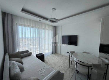 Двухкомнатная квартира 65.5 м², в новом комплексе премиум класса в центре Алании c получением ВНЖ ID-18851 фото-4