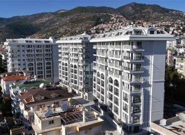 Двухкомнатная квартира 65.5 м², в новом комплексе премиум класса в центре Алании c получением ВНЖ ID-18851 фото-11