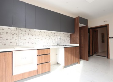 Двухкомнатные апартаменты, 55м². в современной резиденции с инфраструктурой, в районе Махмутлар, Алания ID-18854 фото-4