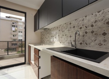 Двухкомнатные апартаменты, 55м². в современной резиденции с инфраструктурой, в районе Махмутлар, Алания ID-18854 фото-6