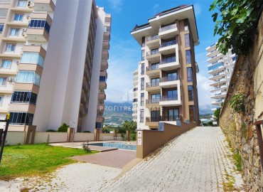 Двухкомнатные апартаменты, 55м². в современной резиденции с инфраструктурой, в районе Махмутлар, Алания ID-18854 фото-16