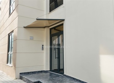 Двухкомнатные апартаменты, 55м². в современной резиденции с инфраструктурой, в районе Махмутлар, Алания ID-18854 фото-17