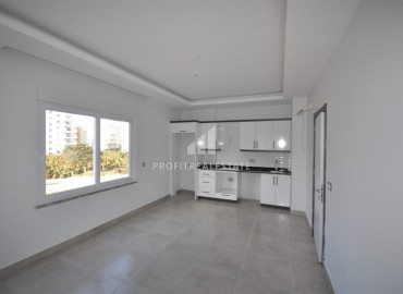 Двухкомнатная квартира, 55м², в комплексе с хорошей инфраструктурой, недалеко от моря в Махмутларе, Алания ID-18858 фото-3