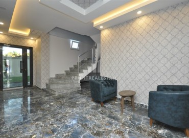 Двухкомнатная квартира, 55м², в комплексе с хорошей инфраструктурой, недалеко от моря в Махмутларе, Алания ID-18858 фото-18