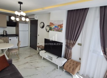 Элегантная трехкомнатная квартира, 72м², в комплексе премиум класса в 200м от моря в Махмутларе, Алания ID-18859 фото-3