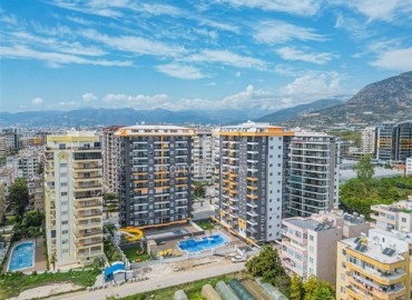 Элегантная трехкомнатная квартира, 72м², в комплексе премиум класса в 200м от моря в Махмутларе, Алания ID-18859 фото-15