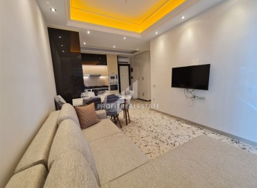 Элегантные двухкомнатные апартаменты, 65м², в новом элитном комплексе в 500м от моря в Махмутларе, Алания. ID-18877 фото-4