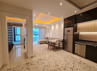 Элегантные двухкомнатные апартаменты, 65м², в новом элитном комплексе в 500м от моря в Махмутларе, Алания. ID-18877 фото-10