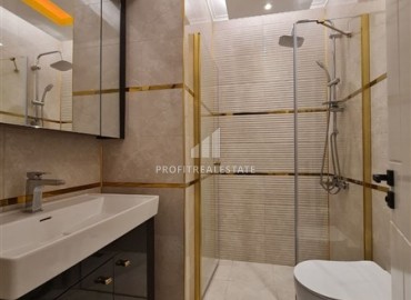 Элегантные двухкомнатные апартаменты, 65м², в новом элитном комплексе в 500м от моря в Махмутларе, Алания. ID-18877 фото-13