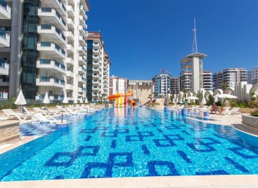 Элегантные двухкомнатные апартаменты, 65м², в новом элитном комплексе в 500м от моря в Махмутларе, Алания. ID-18877 фото-18