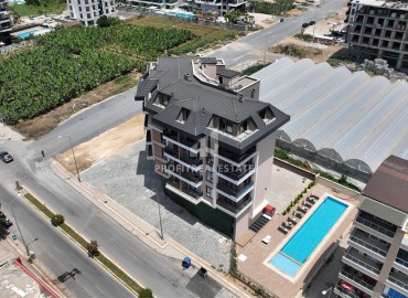 Видовые уютные апартаменты 1+1, 53м², в новостройке с отличной локацией в 200м от моря в районе Каргыджак, Алания ID-18878 фото-18