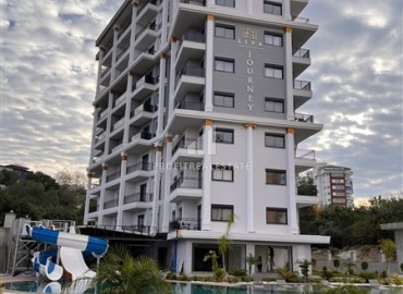 Апартаменты 1+1 в аренду в  500 метрах от центра Тосмура, Аланья. ID-18883 фото-1