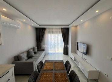 Апартаменты 1+1 в аренду в  500 метрах от центра Тосмура, Аланья. ID-18883 фото-2