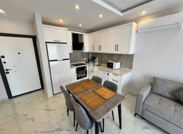 Апартаменты 1+1 в аренду в  500 метрах от центра Тосмура, Аланья. ID-18883 фото-6