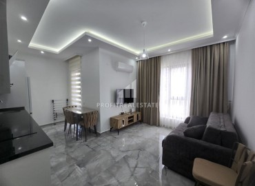 Меблированные апартаменты c одной спальней, 56м², в комфортабельном комплексе в центре Махмутлара, Алания ID-18885 фото-6