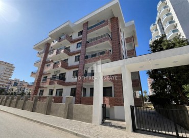 Двухкомнатная квартира, 60м², в новостройке 2025 года с бассейном в Махмутларе, Алания, в 150м от побережья ID-18887 фото-1