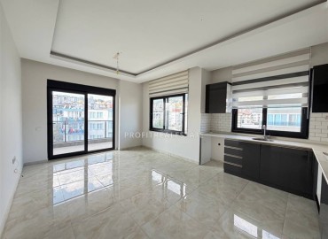 Новая двухкомнатная квартира, 55м², в новом комплексе с инфраструктурой у подножия гор в районе Оба, Алания ID-18895 фото-3