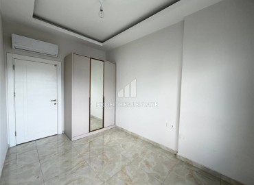 Новая двухкомнатная квартира, 55м², в новом комплексе с инфраструктурой у подножия гор в районе Оба, Алания ID-18895 фото-9