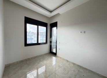 Новая двухкомнатная квартира, 55м², в новом комплексе с инфраструктурой у подножия гор в районе Оба, Алания ID-18895 фото-12