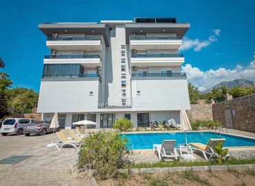 Уютные апартаменты 1+1, 55м², с видом на горы в новом бутик-комплексе в районе Оба, Алания ID-18900 фото-1