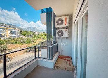 Уютные апартаменты 1+1, 55м², с видом на горы в новом бутик-комплексе в районе Оба, Алания ID-18900 фото-10