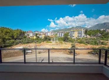 Уютные апартаменты 1+1, 55м², с видом на горы в новом бутик-комплексе в районе Оба, Алания ID-18900 фото-11