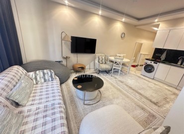 Стильные двухкомнатные апартаменты, 55м², в малоквартирной новостройке в центре Алании, 500м от моря ID-18901 фото-2