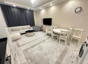 Стильные двухкомнатные апартаменты, 55м², в малоквартирной новостройке в центре Алании, 500м от моря ID-18901 фото-3