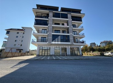 Квартира 1+1, 50м², с чистовой отделкой в новостройке с бассейном в горном районе Алании - Чиплаклы по отличной цене ID-18906 фото-1