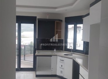 Квартира с одной спальней, 55м², с видом на Аланийскую крепость в новой резиденции в районе Оба, Алания ID-18908 фото-3