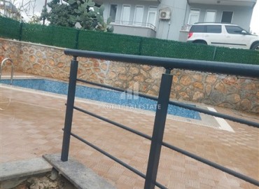 Квартира с одной спальней, 55м², с видом на Аланийскую крепость в новой резиденции в районе Оба, Алания ID-18908 фото-11